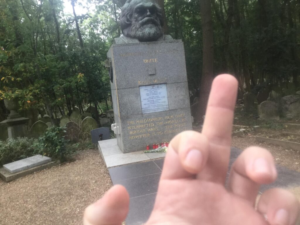 EatPrayGreg.com One Finger Salute to Marx