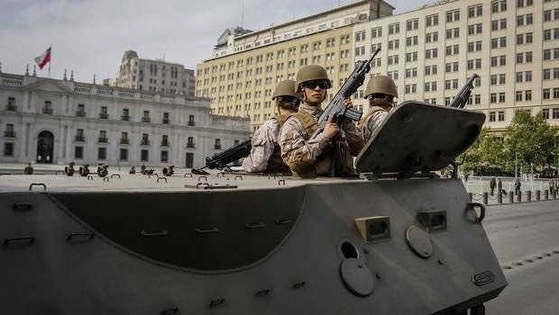 EatPrayGreg.com Soldiers In An APC Outside The Palacio